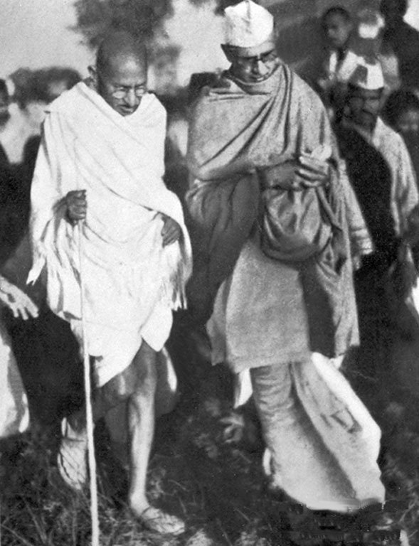 Gandhiji walking with Mahadev Desai at Sevagram