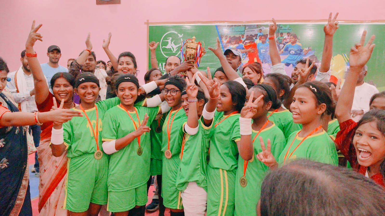Adolescent girls in Jharkhand celebrating with their kabaddi medals